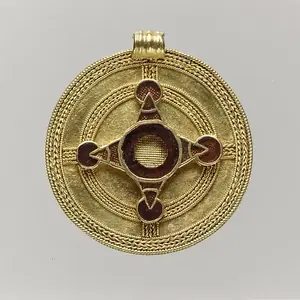 A gold disc pendant from Europe